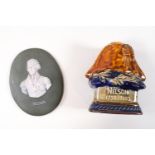 A Royal Doulton earthenware candlestick in the form of Nelson's hat.
