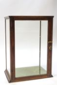 An early 20th century shop display cabinet,