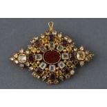 A 19th century yellow metal multigem set brooch.