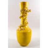 A late 19th/early 20th century Chinese tall necked vase, yellow glazed,