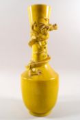 A late 19th/early 20th century Chinese tall necked vase, yellow glazed,