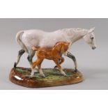A Royal Doulton porcelain figure "A Gude Grey Mare" designed by W M Chance,