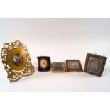 A Victorian gilt metal photograph frame,