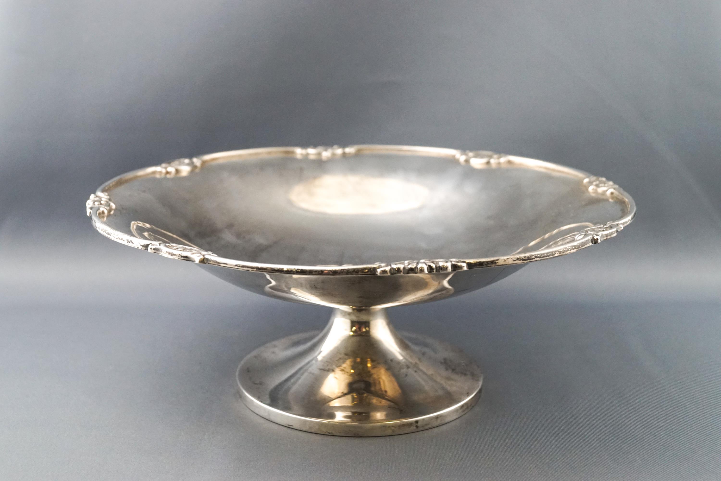 A silver bowl, on flared foot, by Elkington & Co.