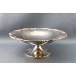 A silver bowl, on flared foot, by Elkington & Co.
