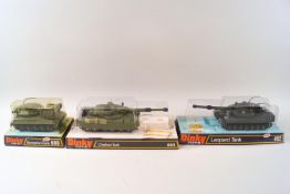 A Dinky Chieftain tank No 683, a Scorpion tank No 698 and a Leopard tank No 692,