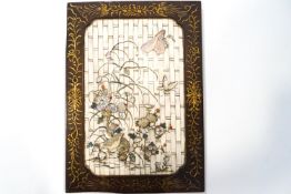 An early 20th century Japanese bone panel with mother or pearl and bone decoration of quail,