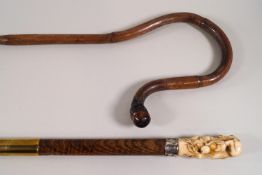 An ivory topped walking stick