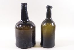 Two late 18th/early 19th century green wine bottles,