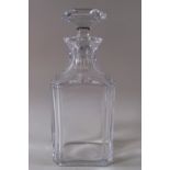 A Baccarat glass spirit decanter, of square plain form with cantered corners and stopper,