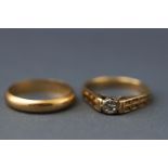 Two yellow metal rings,