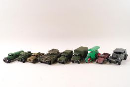 Dinky - A Centurion tank, No 657, Two Army 1 ton Cargo trucks, a Top Deficient,