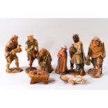 Eight early 20th century German or Swiss carved wood Epiphany figures, comprising Joseph, Mary,