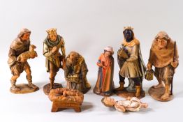 Eight early 20th century German or Swiss carved wood Epiphany figures, comprising Joseph, Mary,