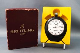 A boxed Breitling sprint stop watch,