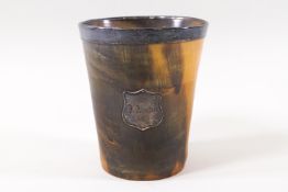 An early 19th Century horn and white metal mounted beaker with glass bottom,