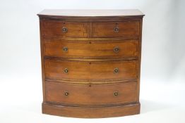 A 19th century mahogany bow front chest of two short and three long drawers,