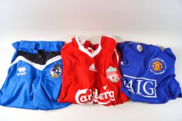 Seven replica football shirts