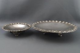 Two Continental white metal dishes, each on three feet, both stamped 800, 20 and 13 cms,