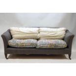 A Howard & Sons sofa on square tapering legs,