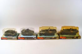 A Dinky open gun carrier No 622, A Striker anti tank vehicle No 691 and two tank destroyers No 694,