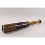 A three pull brass and leather telescope, stamped "Ross London 1907".
