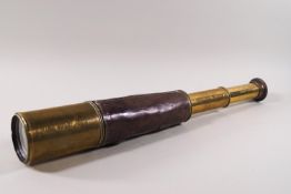 A three pull brass and leather telescope, stamped "Ross London 1907".