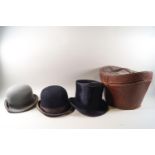A Top hat and two Bowler hats