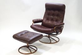 An Ekornes stressless leather reclining chair and matching stool