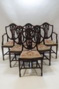 A set of six Sheraton style shield back mahogany dining chairs