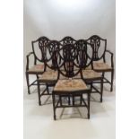 A set of six Sheraton style shield back mahogany dining chairs