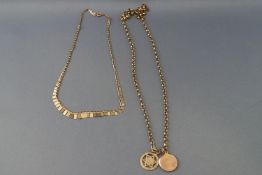 A gold belcher link chain having three attached pendants,