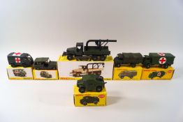 A Dinky military ambulance No 626, a Field Artillery tractor No 688,