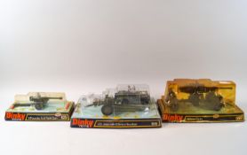 A Dinky US Jeep with 105mm Howitzer No 615, a 6 pounder anti tank gun No 625 and a 88mm gun No 656,