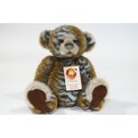 A Charlie Bear, 'Abhay', 40cm high, with tags, limited edition 473 of 4000,