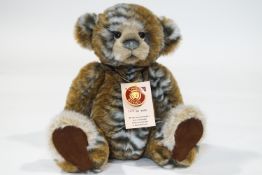 A Charlie Bear, 'Abhay', 40cm high, with tags, limited edition 473 of 4000,