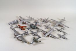 A box of sixteen assorted model aeroplanes, including Dinky Empire Flying boat, PIB Lightening,