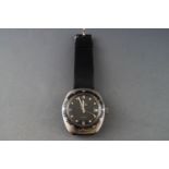 A stainless steel wristwatch. Dial signed Buran Intra-matic.