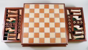 A Robert Burke Chess set, in a chess board box with two drawers,