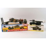 A Dinky Honest John missile launcher, No 665 and an AEC Artic transporter with helicopter No 618,