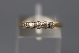 A yellow and white metal five stone diamond ring, stamped 18ct Plat,