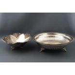 A Continental white metal dish in the form of a flower, stamped 900,