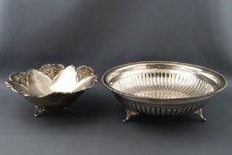 A Continental white metal dish in the form of a flower, stamped 900,