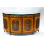 A George III mahogany and satinwood bow fronted commode,