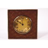 A French gilt metal and leather strut bedside clock,