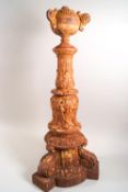 A Victorian cast iron doorstop, with ball finial, later painted,