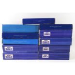 Eleven Hornby Dublo Corridor and Suburban Coaches, three in plain blue boxes,