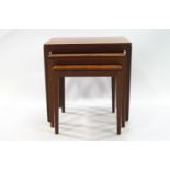 A 20th century mahogany nest of three tables,