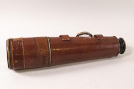 A late 19th century brass and leather three drawer telescope by Dolland,