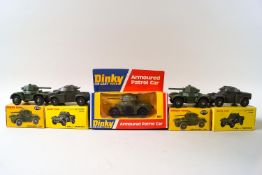 A Dinky armoured patrol car No 667, two armoured cars No 670 and two armoured cars No 814,